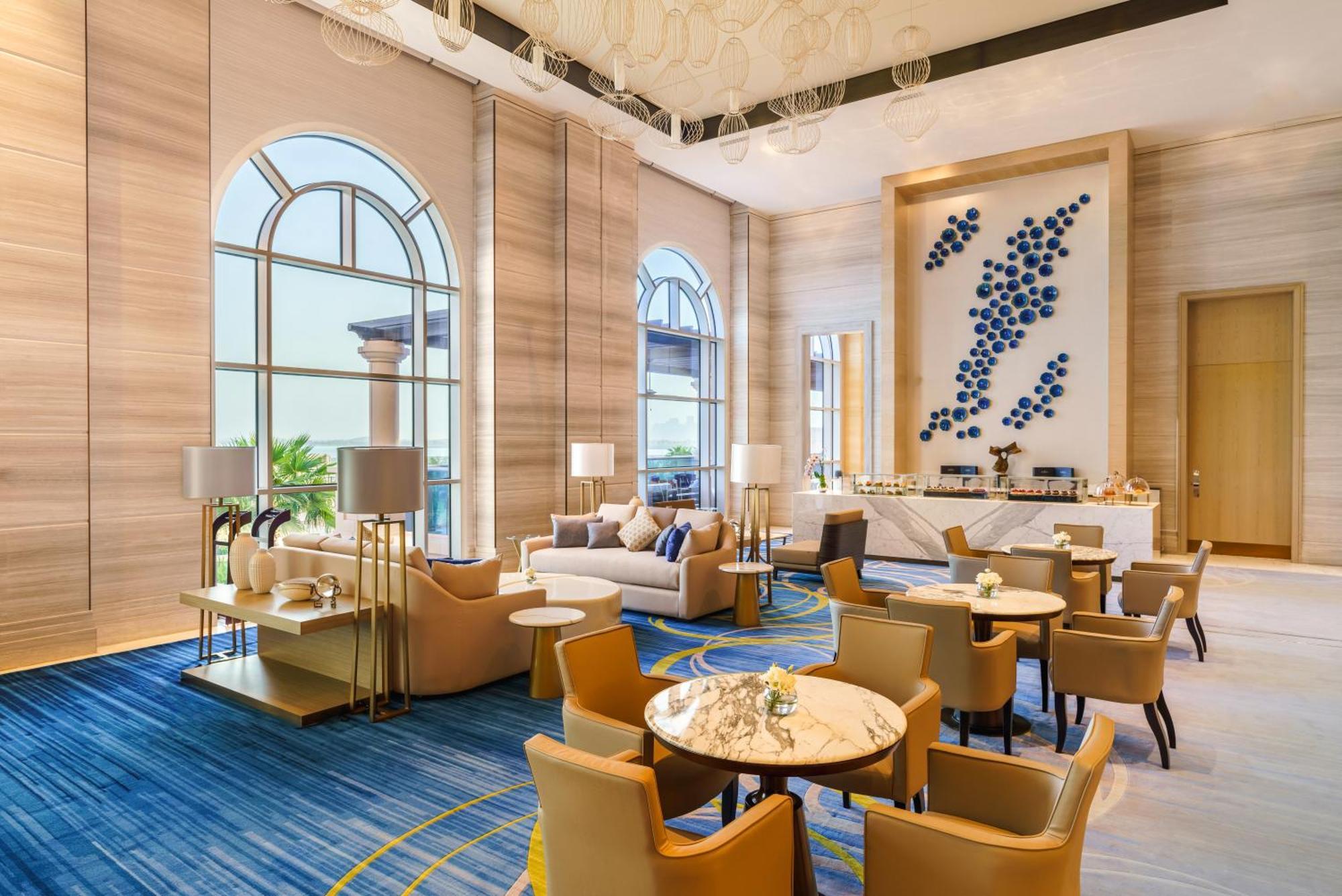 Rixos Marina Abu Dhabi Hotel Exterior foto The Lounge at the airport